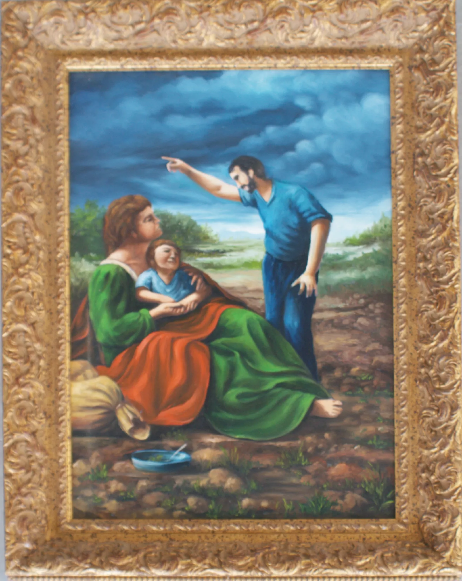 Go-away-Aly-Mohsen "Painting by Aly Mohsen, executed in Oil on canvas (brush). The title is Go away and it belongs to the category The Contemporary World. In Go Away, Aly Mohsen addresses the themes of exclusion, political power, and human vulnerability with clarity and intensity. At the center of the composition, a mother sits on the ground holding her child in an instinctive gesture of protection, forming a universal image of fear and fragility. Facing them stands an authoritative male figure whose features explicitly recall those of a contemporary Italian political leader. With a decisive gesture, he points in a single direction, turning the action into an irrevocable command and transforming the scene into a symbolic representation of institutional rejection. The contrast between the defenseless condition of the mother and child and the authority exercised by the male figure highlights a profound imbalance of power and alludes to exclusionary political practices. The darkened sky and the open landscape in the background intensify the sense of threat and uncertainty. The richly decorated gilded frame, inspired by classical painting traditions, establishes a deliberate contrast with the contemporary urgency of the subject matter, reinforcing the symbolic tension of the image and its connection to historical visual languages. Situated within contemporary symbolic realism, Go Away employs a clear figurative language to convert a concrete situation into an ethical reflection on the human consequences of political decisions."